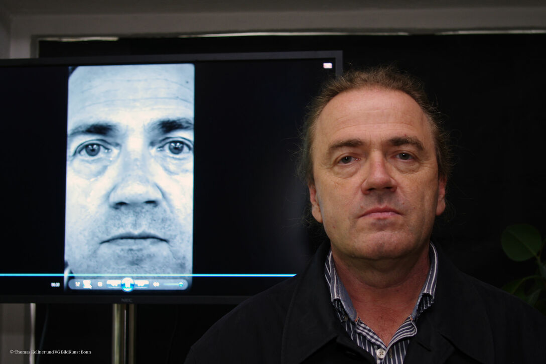 Thomas Kellner in front of his video Good Bye - internal tear. (photo: © Thomas Kellner and VG BildKunst Bonn)
